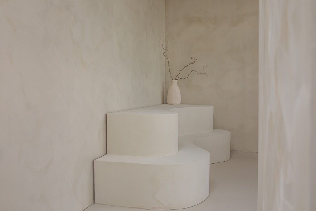 Sanctuary Photo Studio - Minimalist interior with Curved Seat.