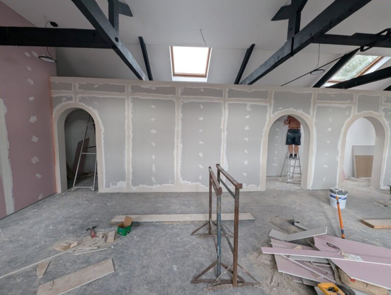The Sanctuary arch wall under construction, with plasterboard joints still exposed