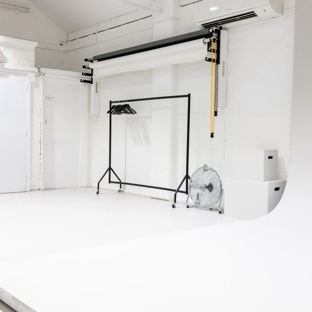 Workshop Photo Studio - Wall Mount Backdrop With Seamless Paper.