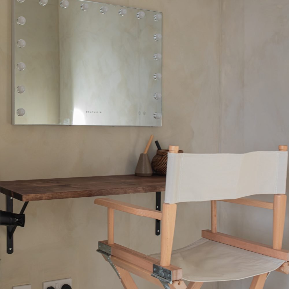 Sanctuary Photo Studio - Minimalist vanity with mirror and chair