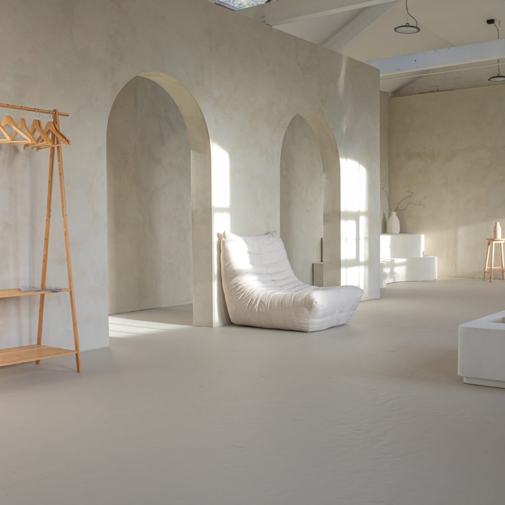 Sanctuary Photo Studio - Minimalist studio with soft natural light.